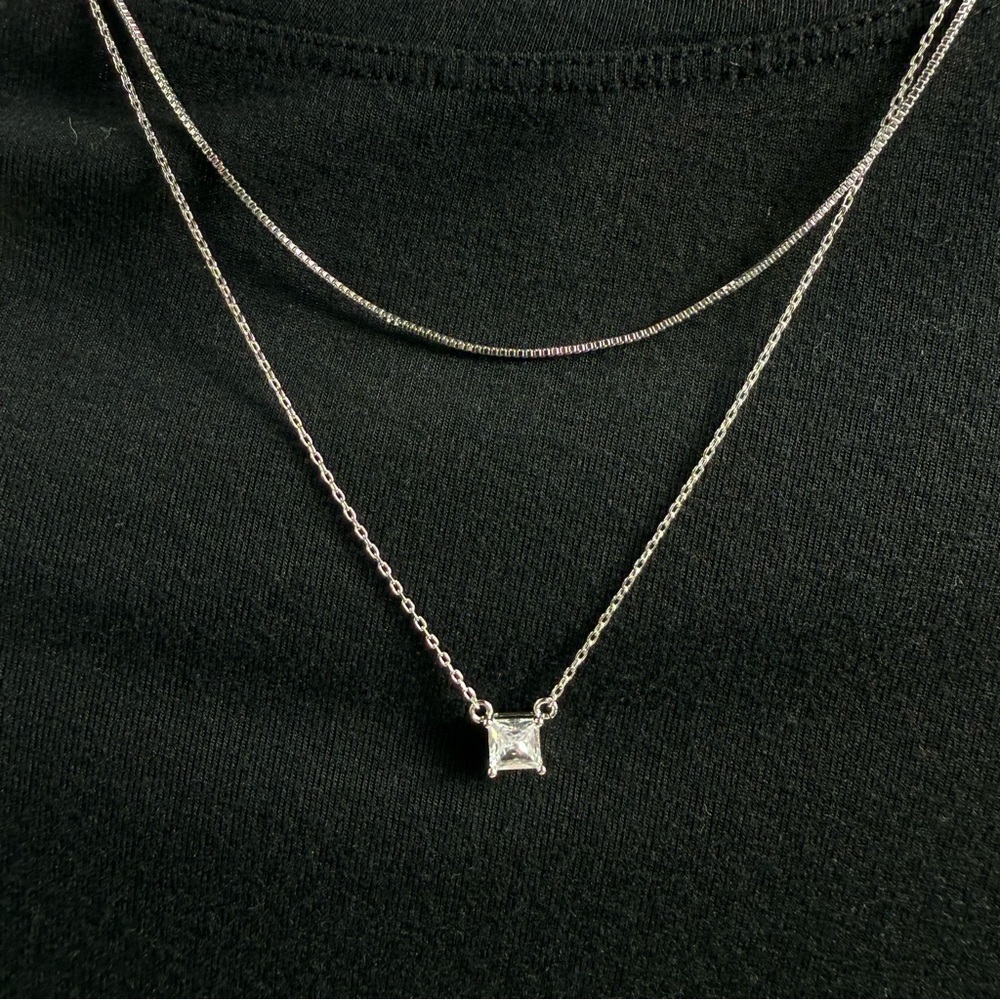 Express Double strand Silver tone necklace.